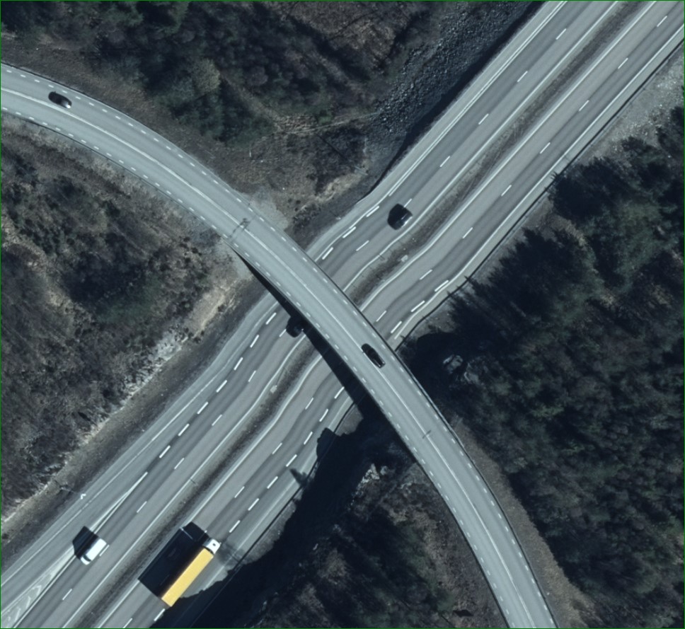 Photo illustrating how ground under bridges looks deformed in orthophotos.